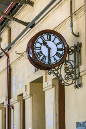 A classic clock with Roman numerals at the deactivated train station, today Estacao Cultura in Campinas, in the interior of the state of Sao Paulo, Brazil
