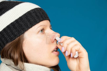 Photo for The girl drips her nose, cold and runny nose - Royalty Free Image