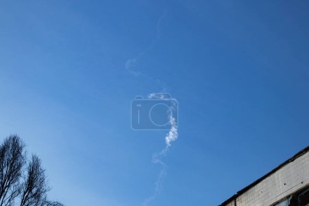 Photo for The work of Ukrainian air defense in the sky, a trace in the sky from air defense over the city of Dnepr in Ukraine during a missile attack, the war in Ukraine 2023 - Royalty Free Image
