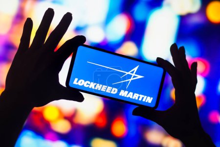Photo for December 10, 2022, Brazil. In this photo illustration, the Lockheed Martin Corporation logo is displayed on a smartphone screen - Royalty Free Image