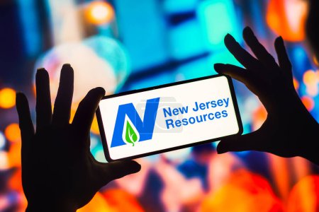 Photo for December 13, 2022, Brazil. In this photo illustration, the New Jersey Resources Corporation logo is displayed on a smartphone mobile screen - Royalty Free Image