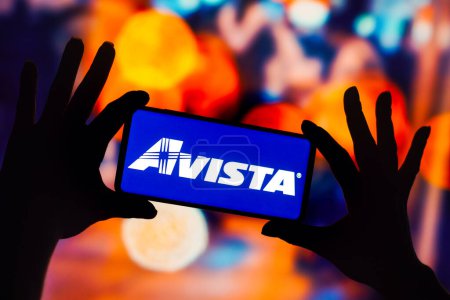 Photo for December 13, 2022, Brazil. In this photo illustration, the Avista Corporation logo is displayed on a smartphone mobile screen - Royalty Free Image