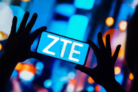 Photo for December 26, 2022, Brazil. In this photo illustration, the ZTE logo is displayed on a smartphone mobile screen - Royalty Free Image