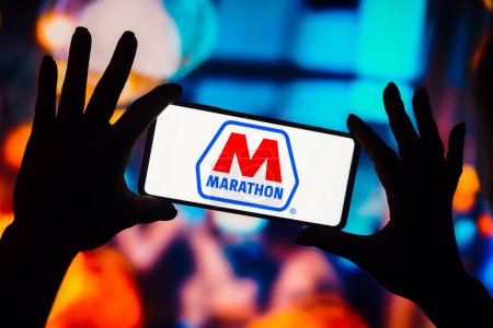 Photo for January 4, 2023, Brazil. In this photo illustration, the Marathon Petroleum Corporation logo is displayed on a smartphone screen - Royalty Free Image