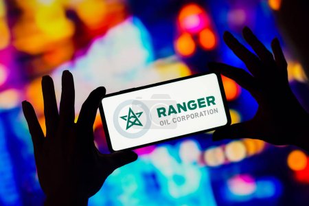 Photo for January 7, 2023, Brazil. In this photo illustration, the Ranger Oil Corporation logo is displayed on a smartphone screen - Royalty Free Image