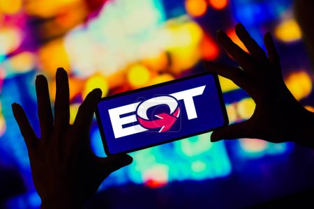 Photo for January 7, 2023, Brazil. In this photo illustration, the EQT Corporation logo is displayed on a smartphone screen - Royalty Free Image
