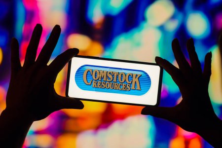 Photo for January 7, 2023, Brazil. In this photo illustration, the Comstock Resources logo is displayed on a smartphone screen - Royalty Free Image