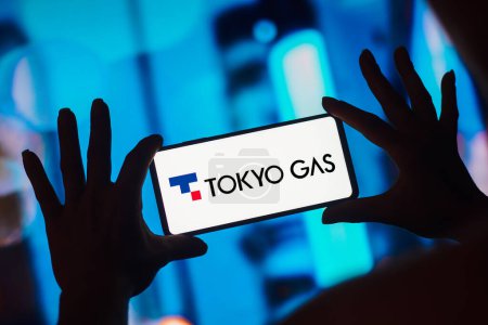 Photo for January 8, 2023, Brazil. In this photo illustration, the Tokyo Gas logo is displayed on a smartphone screen - Royalty Free Image