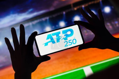 Photo for January 9, 2023, Brazil. In this photo illustration, the ATP 250 (ATP World Tour 250) logo is displayed on a smartphone screen - Royalty Free Image