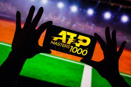 Téléchargez les photos : January 9, 2023, Brazil. In this photo illustration, the ATP Masters 1000 logo is displayed on a smartphone screen - en image libre de droit