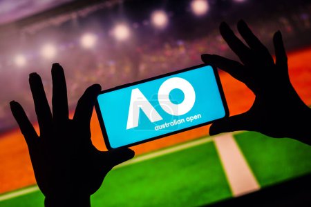 Photo for January 9, 2023, Brazil. In this photo illustration, the Australian Open (Happy Slam) logo is displayed on a smartphone screen - Royalty Free Image