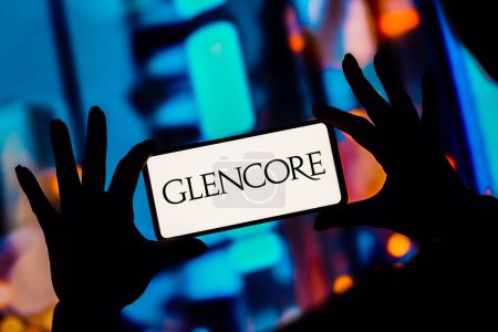 Photo for January 11, 2023, Brazil. In this photo illustration, the Glencore Xstrata plc logo is displayed on a smartphone screen - Royalty Free Image
