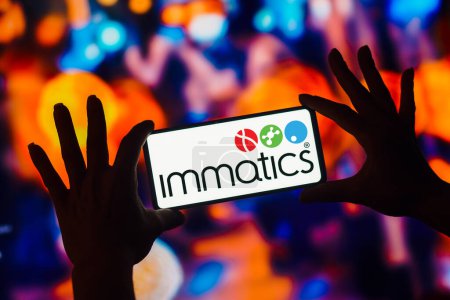 Téléchargez les photos : January 13, 2023, Brazil. In this photo illustration, the Immatics logo is displayed on a smartphone screen - en image libre de droit