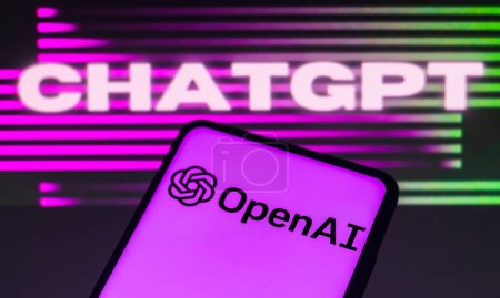 Foto de February 2, 2023, Brazil. In this photo illustration, the OpenAI logo is displayed on a smartphone screen, ChatGPT in the background - Imagen libre de derechos