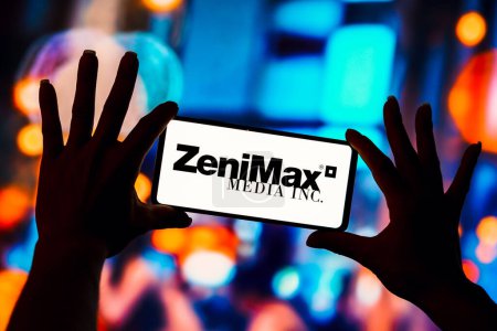 Photo for February 7, 2023, Brazil. In this photo illustration, the ZeniMax Media logo is displayed on a smartphone screen - Royalty Free Image