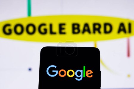 Foto de February 9, 2023, Brazil. In this photo illustration, the Google logo is displayed on a smartphone screen, in the background the Google Bard AI logo - Imagen libre de derechos