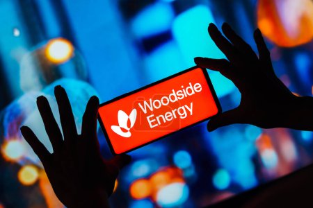 Photo for February 15, 2023, Brazil. In this photo illustration, the Woodside Energy logo is seen displayed on a smartphone - Royalty Free Image