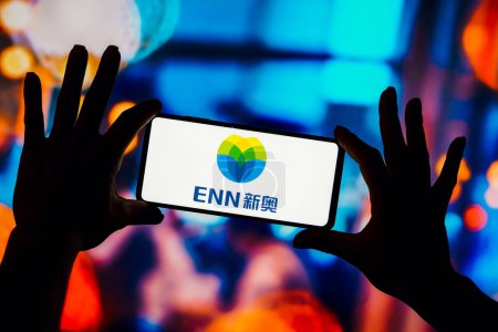 Photo for February 15, 2023, Brazil. In this photo illustration, the ENN Energy Holdings Limited logo is seen displayed on a smartphone - Royalty Free Image