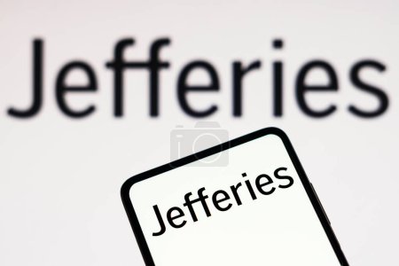 Photo for February 16, 2023, Brazil. In this photo illustration the Jefferies Group logo seen displayed on a smartphone - Royalty Free Image