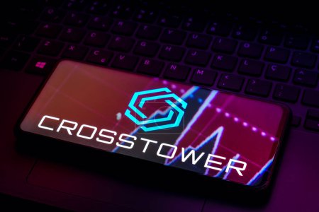 Foto de February 28, 2023, Brazil. In this photo illustration, the CrossTower logo seen displayed on a smartphone - Imagen libre de derechos