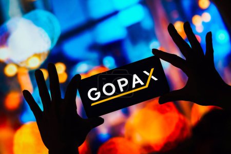 Photo for March 4, 2023, Brazil. In this photo illustration, the Gopax logo seen displayed on a smartphone - Royalty Free Image