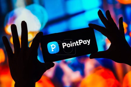 Photo for March 4, 2023, Brazil. In this photo illustration, the PointPay logo seen displayed on a smartphone - Royalty Free Image
