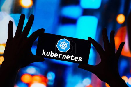 Photo for March 6, 2023, Brazil. In this photo illustration, the Kubernetes logo seen displayed on a smartphone - Royalty Free Image