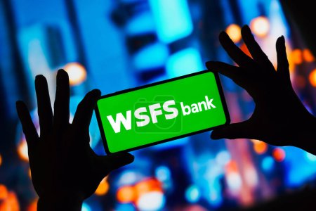 Photo for March 9, 2023, Brazil. In this photo illustration, the WSFS Bank logo seen displayed on a smartphone - Royalty Free Image
