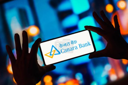 Photo for March 11, 2023, Brazil. In this photo illustration, the Canara Bank logo seen displayed on a smartphone - Royalty Free Image