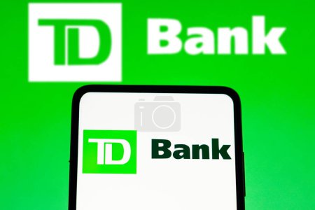 Photo for March 15, 2023, Brazil. In this photo illustration, the TD Bank logo seen displayed on a smartphone - Royalty Free Image