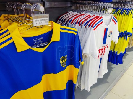 Photo for April 18, 2023, Paraguay. Club Atltico Boca Juniors and Olympique de Marseille shirts for sale in a sporting goods store in the city of Pedro Juan Caballero, Paraguay. - Royalty Free Image