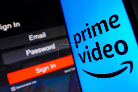 Photo for May 2, 2023, Brazil. In this photo illustration, the Amazon Prime Video logo is displayed on a smartphone screen, next to a login screen, with email, password and sign in - Royalty Free Image