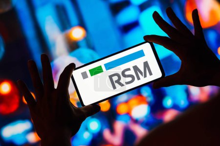 Photo for May 4, 2023, Brazil. In this photo illustration, the RSM International logo is displayed on a smartphone screen - Royalty Free Image