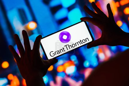 Photo for May 4, 2023, Brazil. In this photo illustration, the Grant Thornton logo is displayed on a smartphone screen - Royalty Free Image