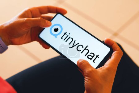 Photo for May 12, 2023, Brazil. In this photo illustration, the Tinychat logo is displayed on a smartphone screen - Royalty Free Image