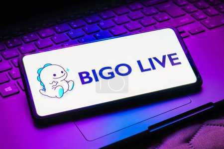 Photo for May 12, 2023, Brazil. In this photo illustration, the Bigo Live logo is displayed on a smartphone screen - Royalty Free Image