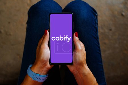 Photo for May 28, 2023, Brazil. In this photo illustration, the Cabify logo is displayed on a smartphone screen - Royalty Free Image