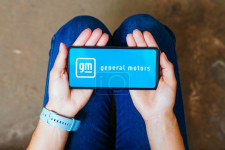 Photo for June 6, 2023, Brazil. In this photo illustration, the General Motors Company (GM) logo is displayed on a smartphone screen - Royalty Free Image
