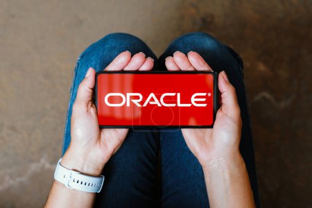 Photo for June 9, 2023, Brazil. In this photo illustration, the Oracle Corporation logo is displayed on a smartphone screen - Royalty Free Image