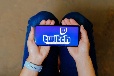Photo for June 28, 2023, Brazil. In this photo illustration, the Twitch logo is displayed on a smartphone mobile - Royalty Free Image