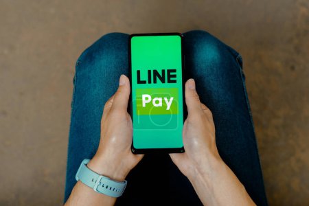 Photo for June 30, 2023, Brazil. In this photo illustration, the LINE Pay logo is displayed on a smartphone screen - Royalty Free Image