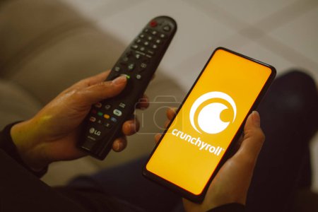 Photo for July 13, 2023, Brazil. In this photo illustration, the Crunchyroll logo seen displayed on a smartphone - Royalty Free Image