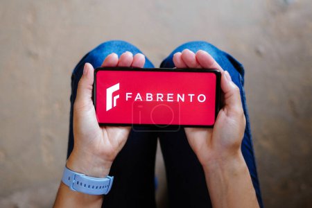 Téléchargez les photos : July 18, 2023, Brazil. In this photo illustration, the Fabrento logo seen displayed on a smartphone - en image libre de droit