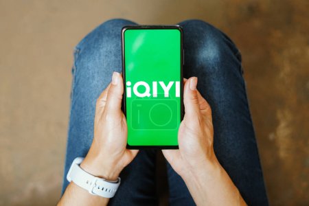 Photo for July 21, 2023, Brazil. In this photo illustration, the IQIYI logo seen displayed on a smartphone - Royalty Free Image