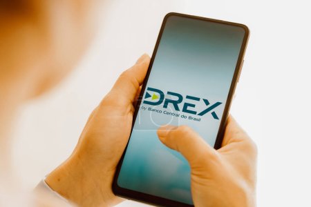 Photo for August 8, 2023, Brazil. In this photo illustration, the Drex logo seen displayed on a smartphone. Drex is the new Brazilian digital currency launched by the Central Bank - Royalty Free Image