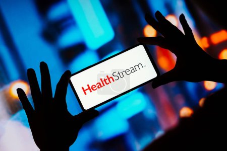 Photo for August 28, 2023, Brazil. In this photo illustration, the HealthStream logo seen displayed on a smartphone - Royalty Free Image