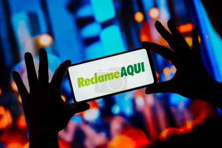Photo for August 30, 2023, Brazil. In this photo illustration, the Reclame Aqui logo is displayed on a smartphone screen - Royalty Free Image