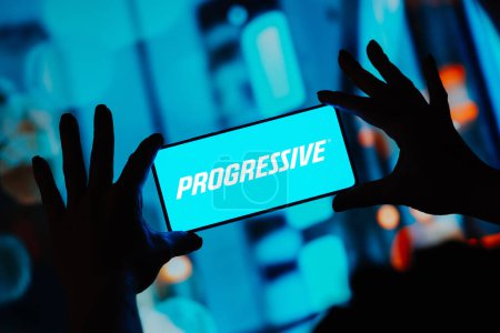 Photo for September 3, 2023, Brazil. In this photo illustration, the Progressive Corporation logo is displayed on a smartphone screen - Royalty Free Image
