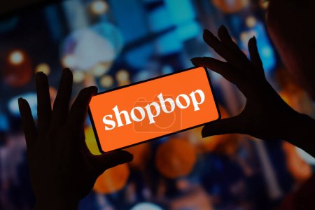 Photo for September 11, 2023, Brazil. In this photo illustration, the Shopbop logo is displayed on a smartphone screen - Royalty Free Image