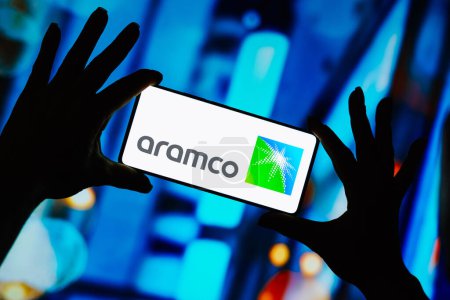 Photo for September 13, 2023, Brazil. In this photo illustration, the Saudi Aramco logo is displayed on a smartphone screen - Royalty Free Image